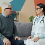 Senior man consulting with a doctor in a modern medical office