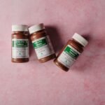 Bottles of magnesium supplement tablets used for sleep support